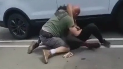 VIDEO: Man fights teen in convenience store parking lot
